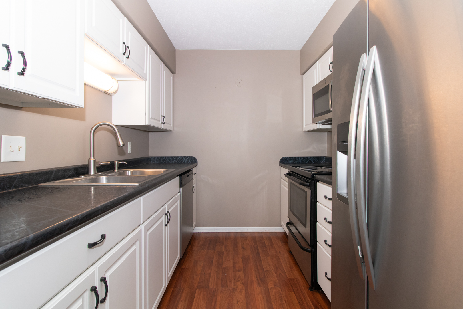 1705 Rockingham Drive, Unit 3 Normal, IL 61761 - Photo 10 of 31 a kitchen with a sink appliances and cabinets