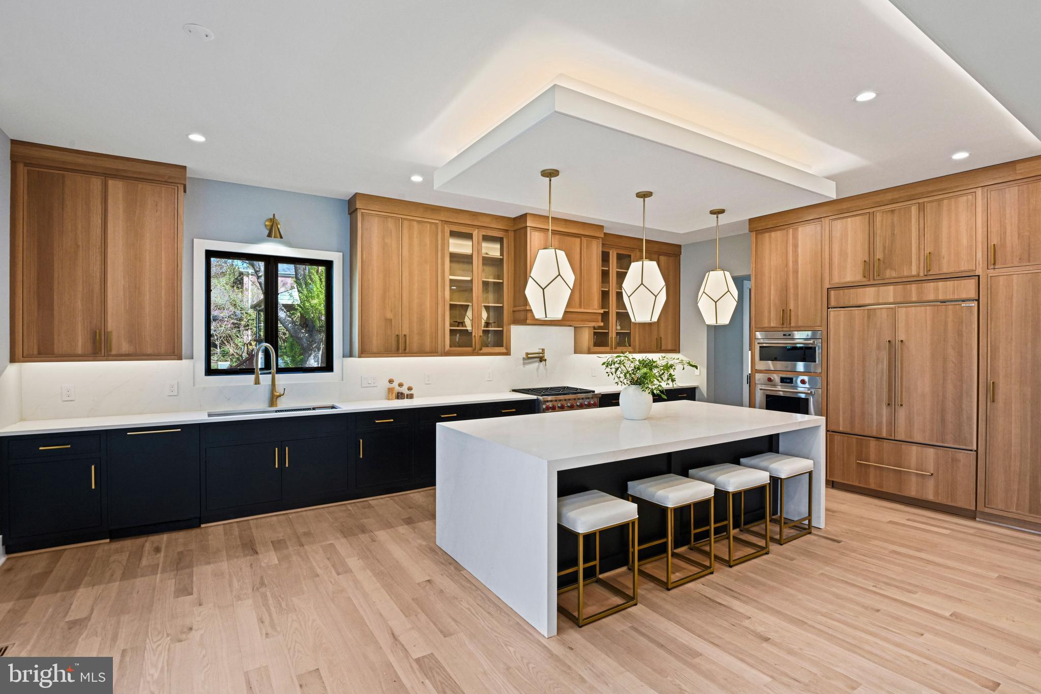 1052 Balls Hill Road McLean, VA 22101 - Photo 14 of 64 a large kitchen with a table and chairs