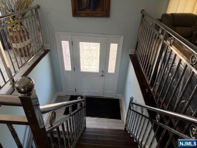 177 Maple Street Fairview, NJ 07022 - Photo 4 of 24 a view of a balcony with wooden floor