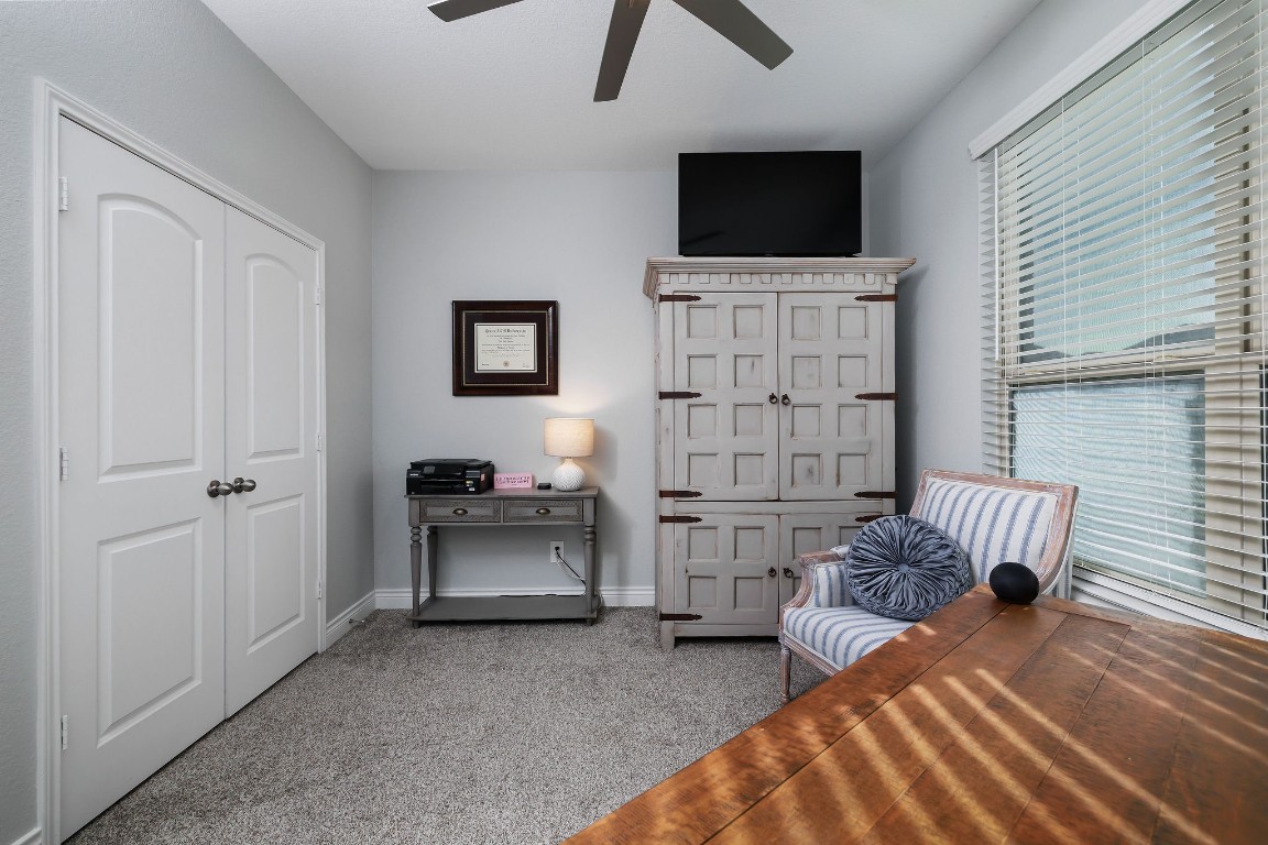 1507 Oakdale Crest Road Montgomery, TX 77316 - Photo 10 of 23 a bedroom with furniture and a flat screen tv