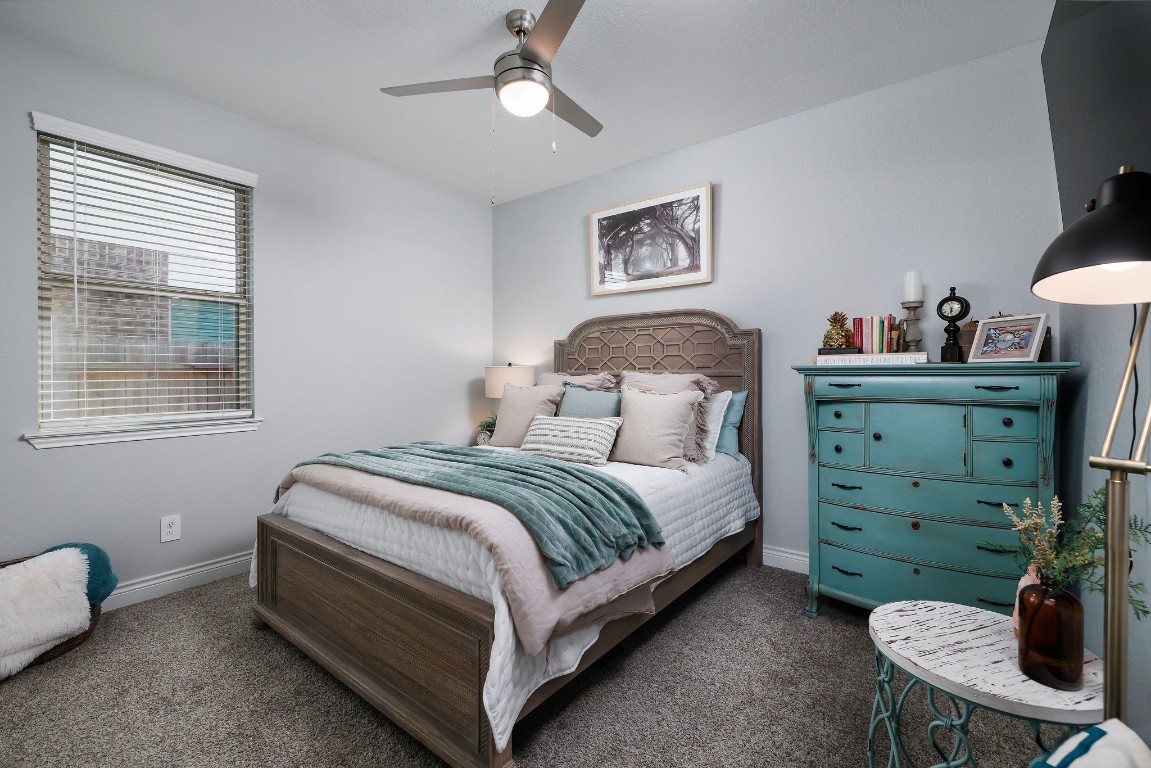 1507 Oakdale Crest Road Montgomery, TX 77316 - Photo 12 of 23 a bedroom with a bed and a window