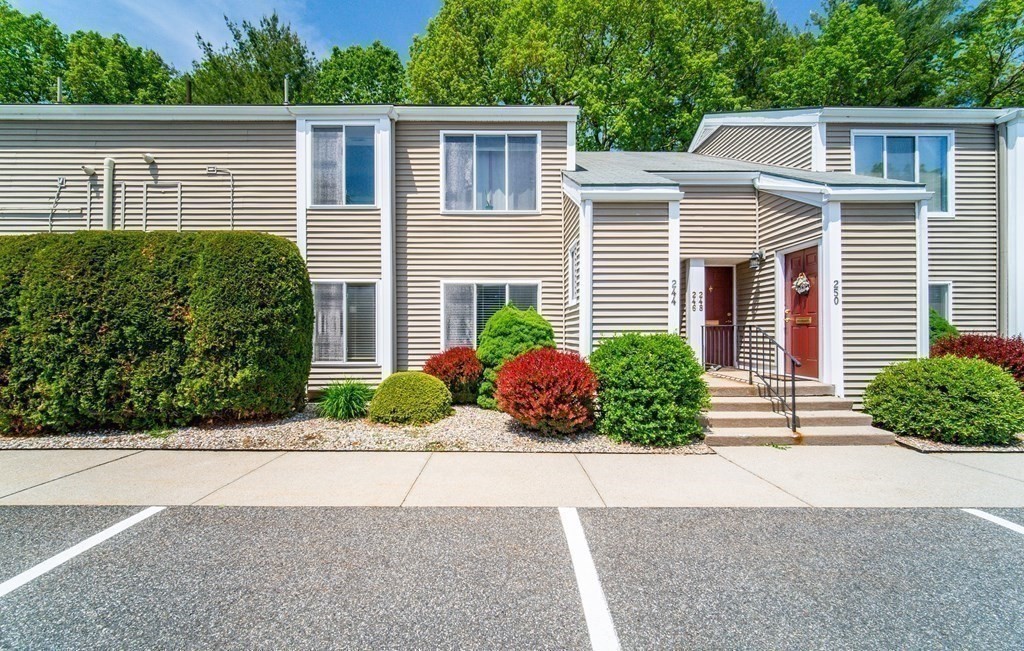 front view of a house and a yard