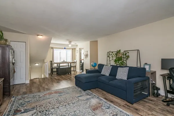 a living room with furniture and a couch