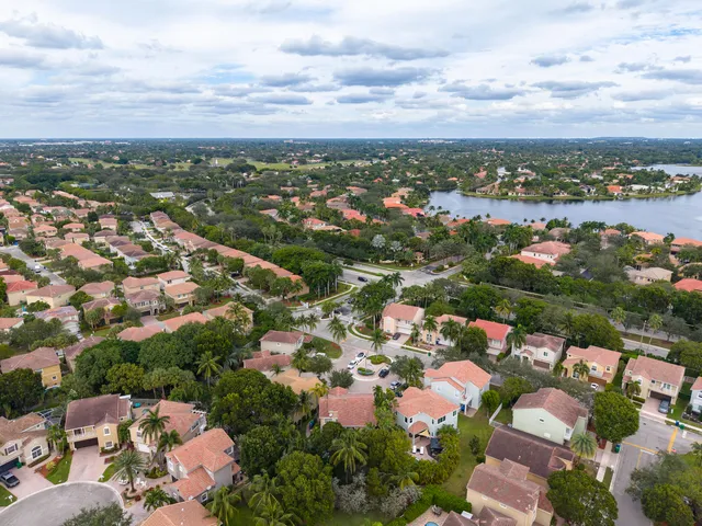 an aerial view of a city with lots of residential buildings