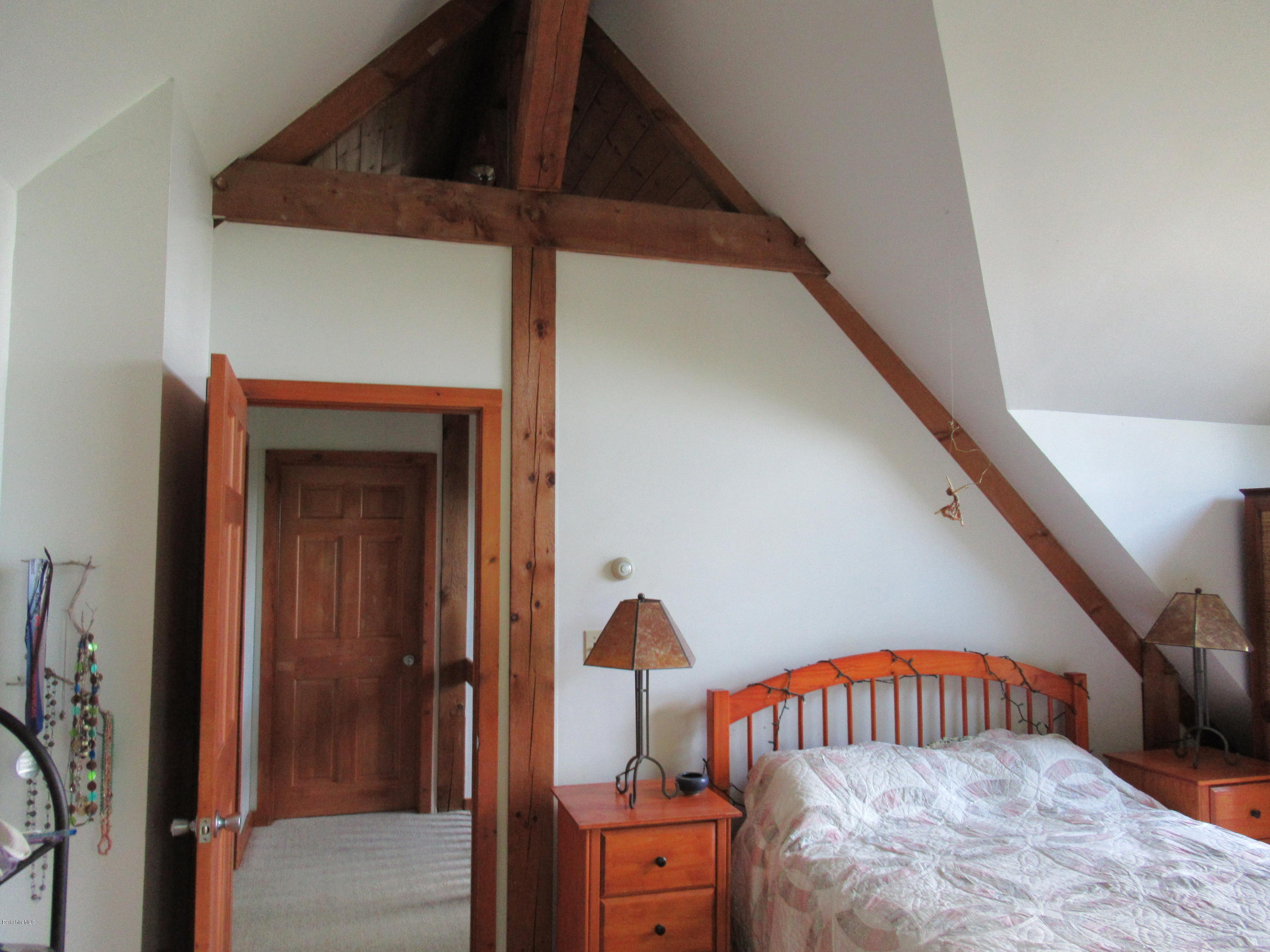 7 Noppet Road Lanesborough, MA 01237 - Photo 19 of 42 a view of a bedroom with wooden floor
