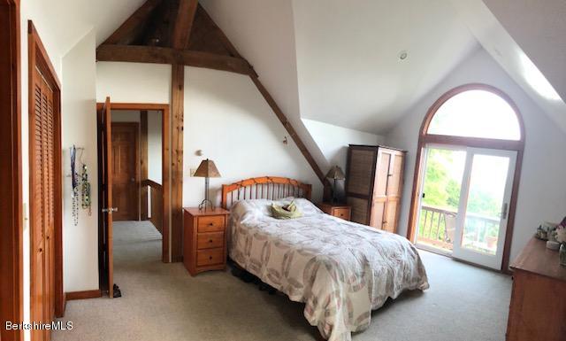 7 Noppet Road Lanesborough, MA 01237 - Photo 20 of 42 a bedroom with a bed and a large window