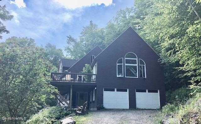 7 Noppet Road Lanesborough, MA 01237 - Photo 3 of 42 a front view of a house with garden