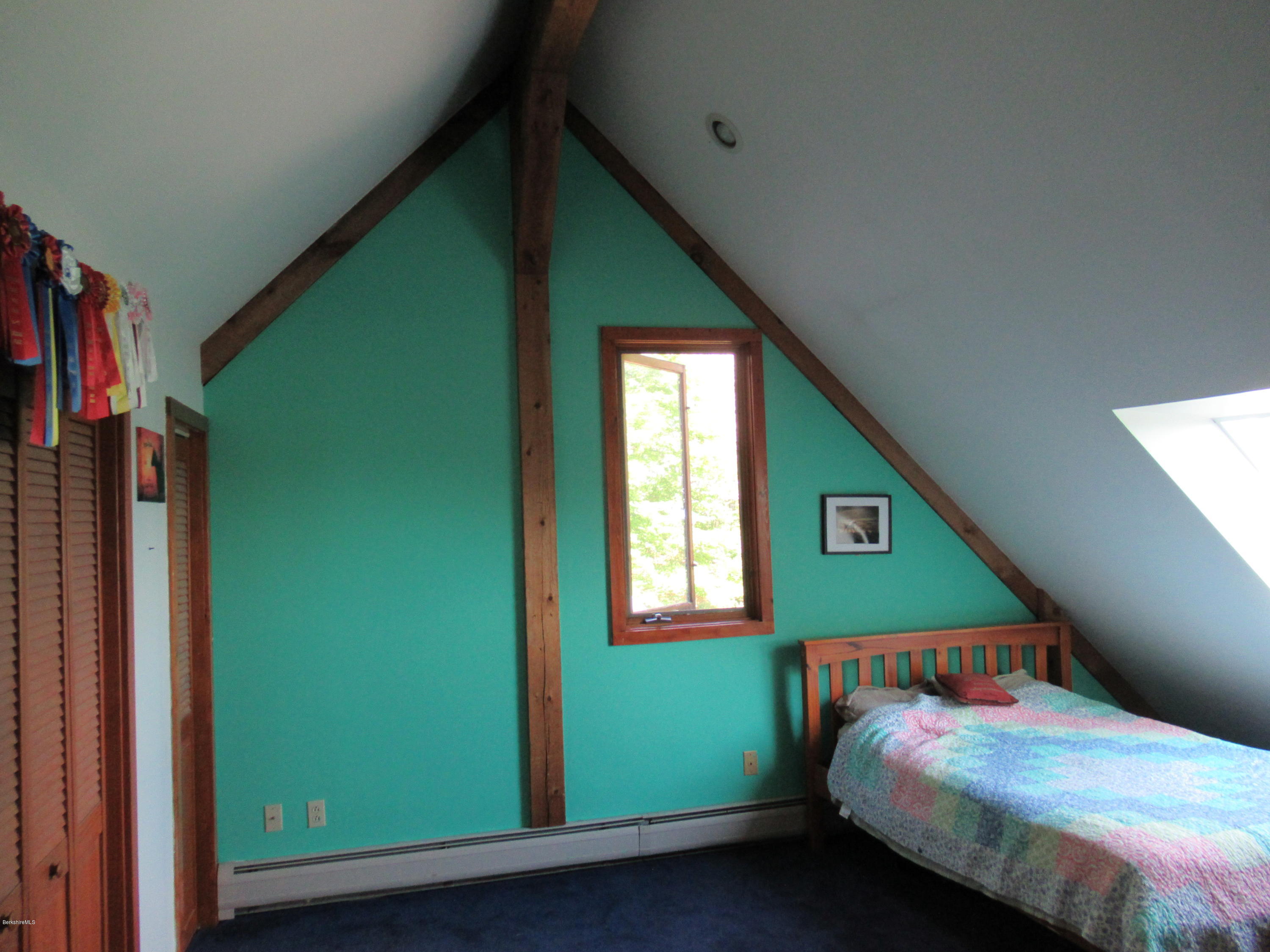 7 Noppet Road Lanesborough, MA 01237 - Photo 26 of 42 a bedroom with a bed and a window