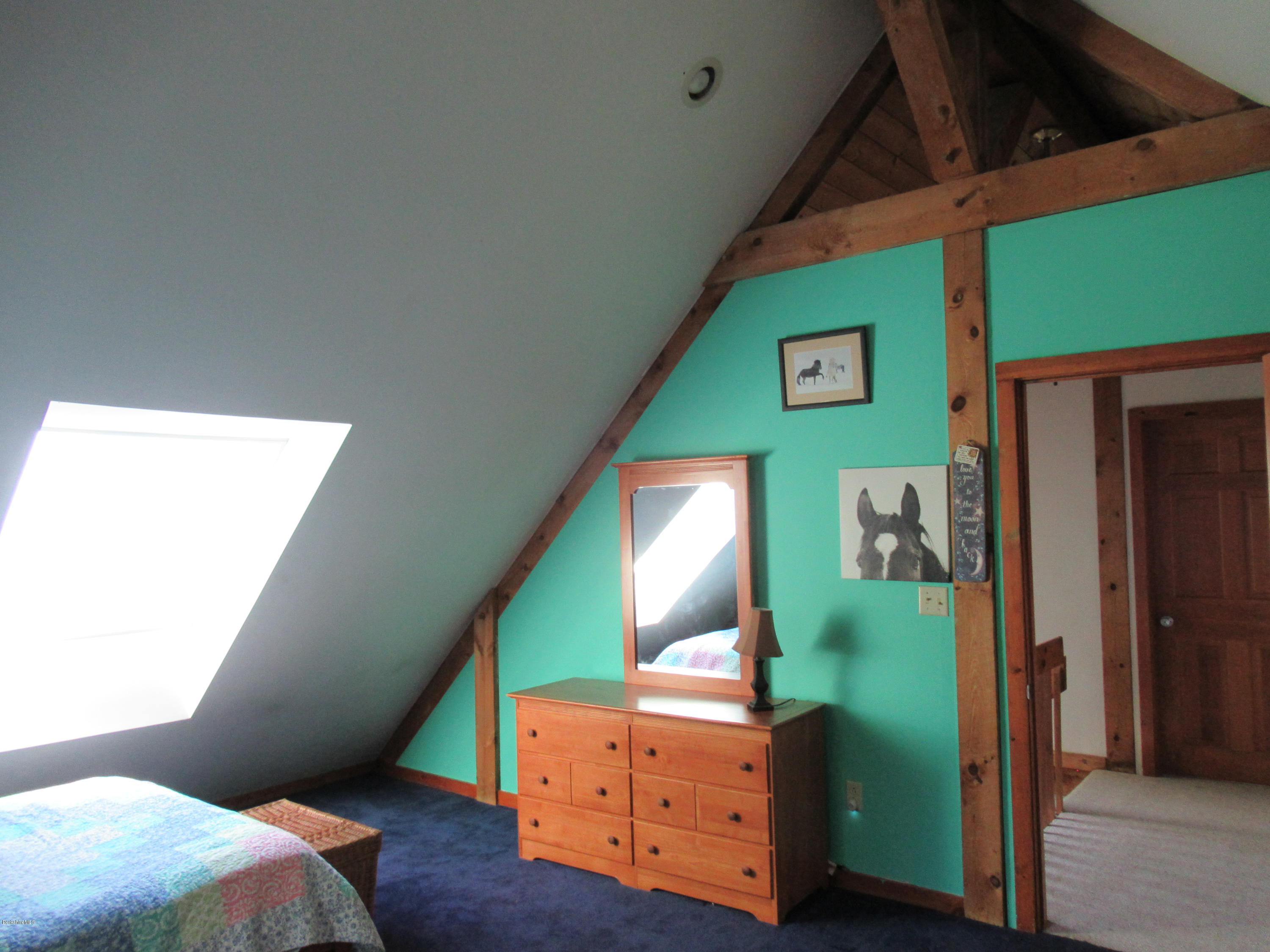 7 Noppet Road Lanesborough, MA 01237 - Photo 27 of 42 a bedroom with a bed and a dresser