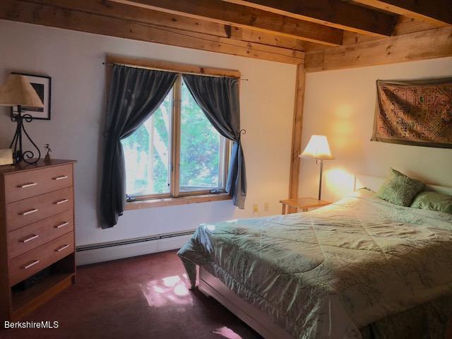 7 Noppet Road Lanesborough, MA 01237 - Photo 29 of 42 a bedroom with a bed and a window