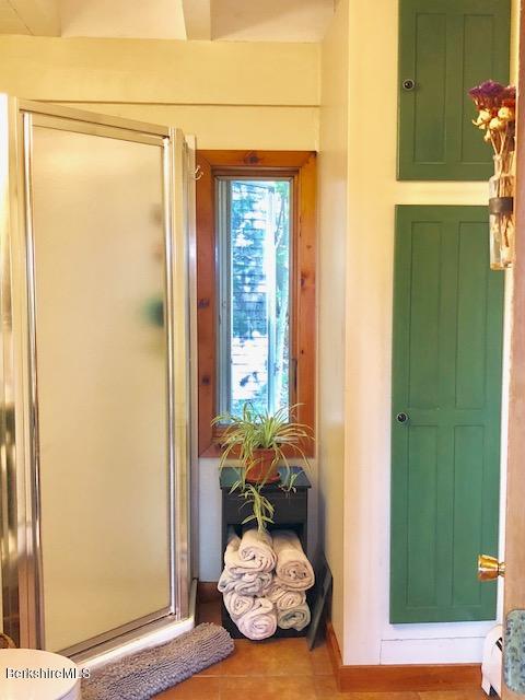 7 Noppet Road Lanesborough, MA 01237 - Photo 30 of 42 a view of a porch with furniture