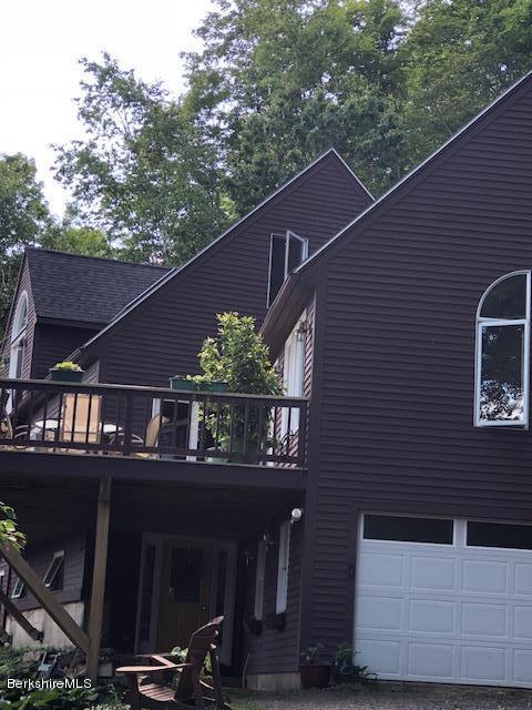 7 Noppet Road Lanesborough, MA 01237 - Photo 4 of 42 a front view of a house with a yard