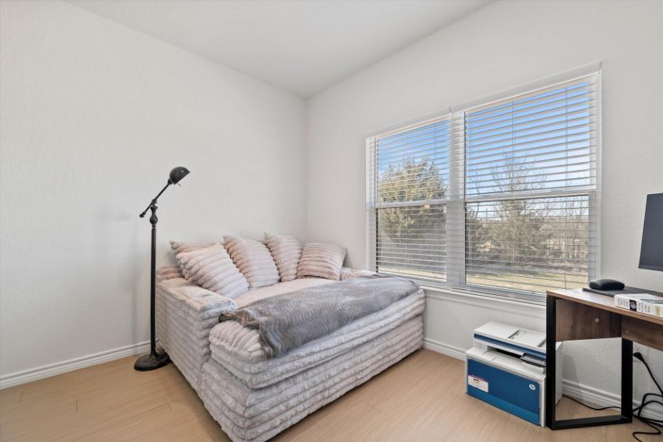 298 Greanead Road Forestburg, TX 76239 - Photo 25 of 38 a living room with furniture and a window