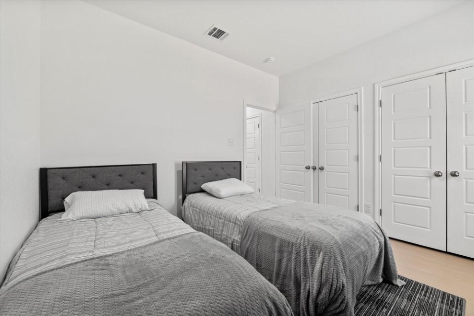 298 Greanead Road Forestburg, TX 76239 - Photo 31 of 38 a bedroom with double bed and a closet