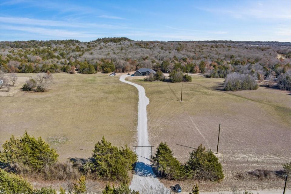 298 Greanead Road Forestburg, TX 76239 - Photo 7 of 38 a view of a dry yard with mountain
