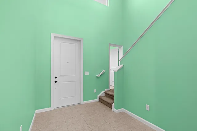 a view of a room with windows