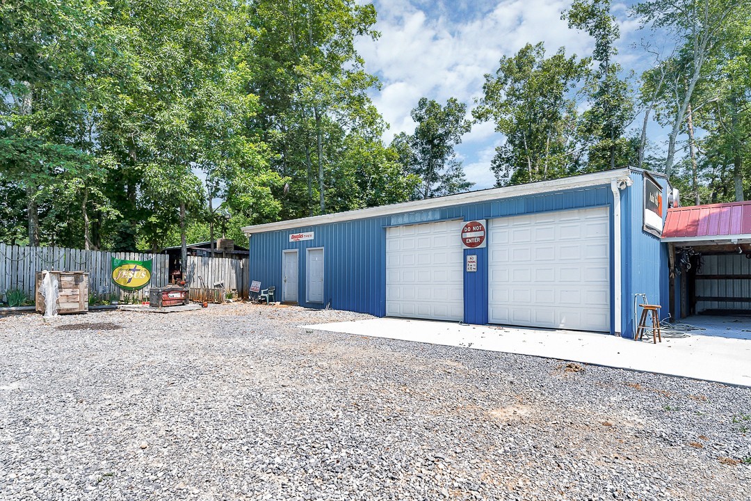 0 Bryan Road McMinnville, TN 37110 - Photo 2 of 24 a front view of a house with a garage