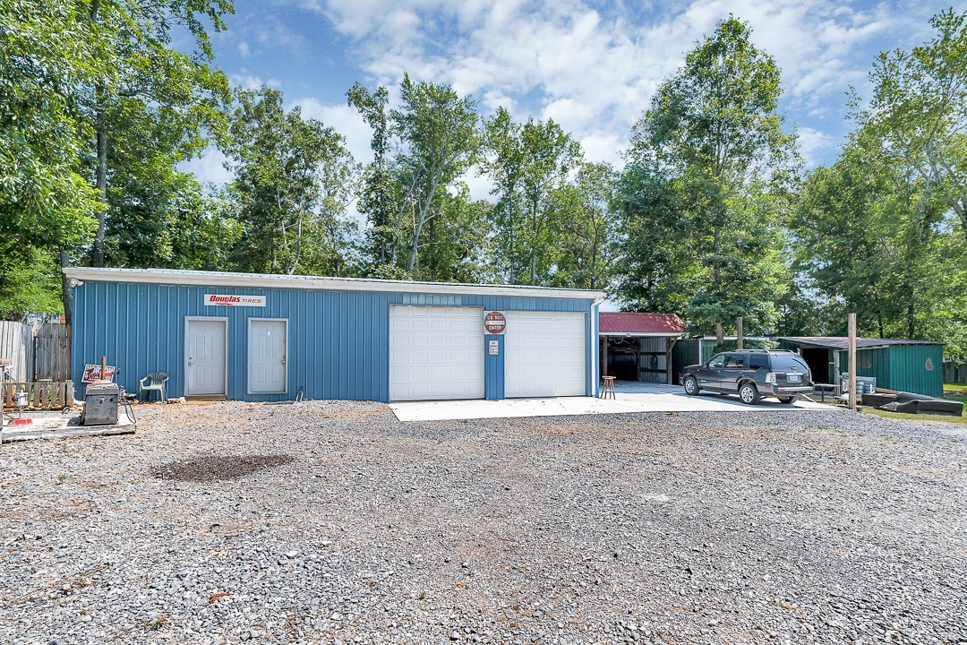 0 Bryan Road McMinnville, TN 37110 - Photo 3 of 24 a house with trees in the background