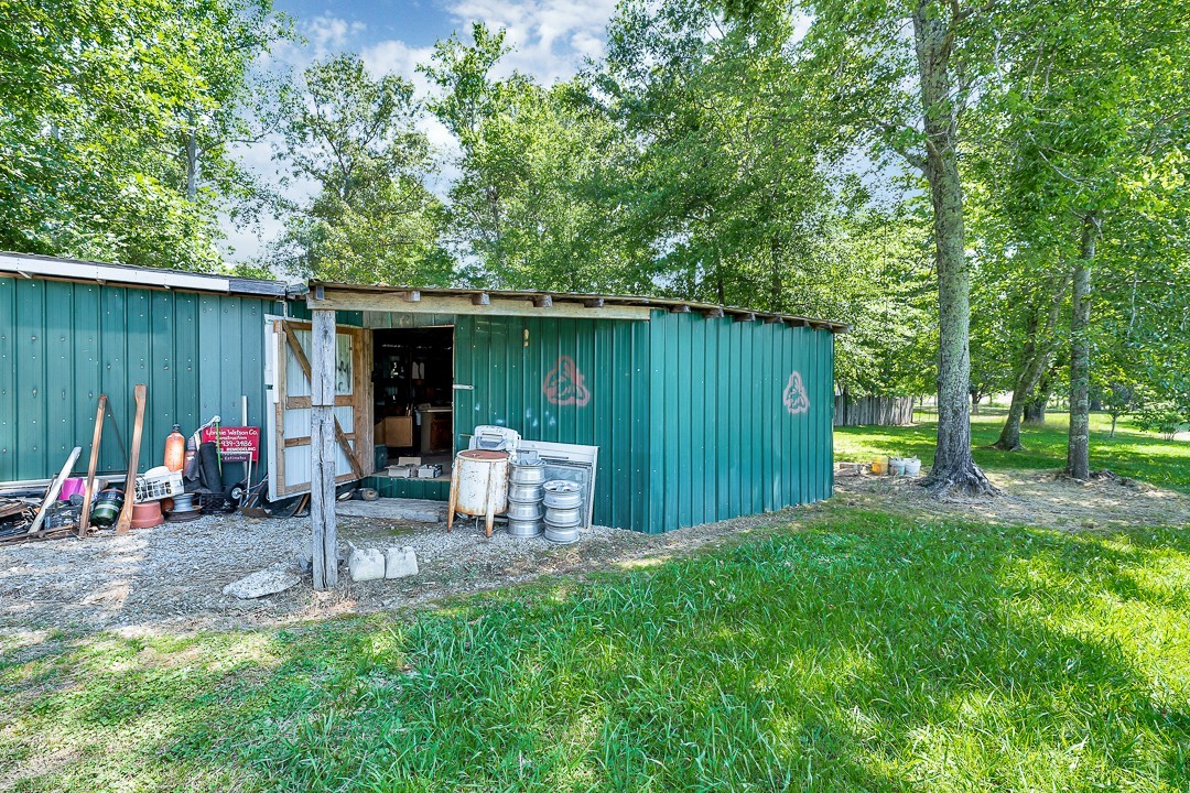 0 Bryan Road McMinnville, TN 37110 - Photo 8 of 24 a view of a chair and table in backyard of the house