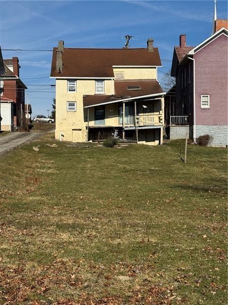 2822 Main Street Beallsville, PA 15313 - Photo 2 of 11 an aerial view of a house with a yard