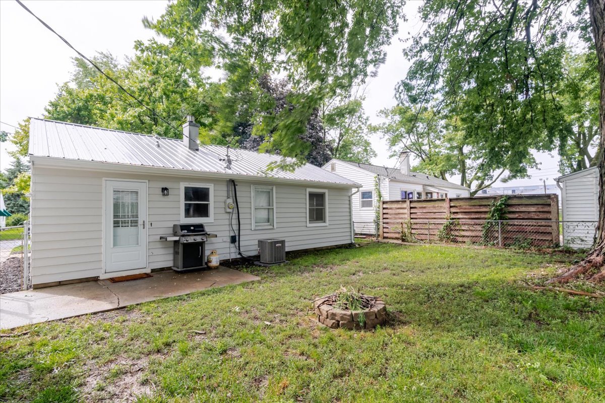307 Meadows Avenue Bloomington, IL 61701 - Photo 15 of 15 a view of a house with a yard