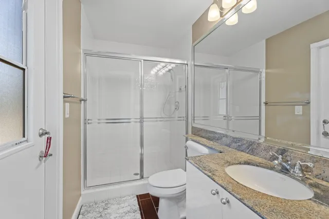 a workspace with furniture bookshelf and a window