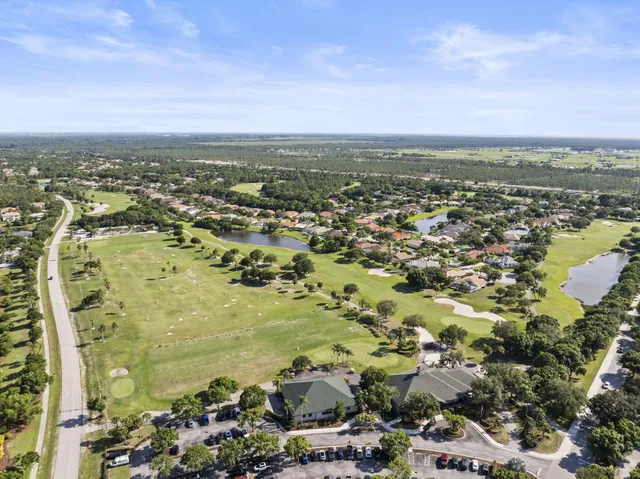 an aerial view of residential houses with city view and lake view