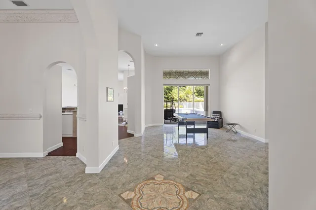 a view of a livingroom with furniture and window