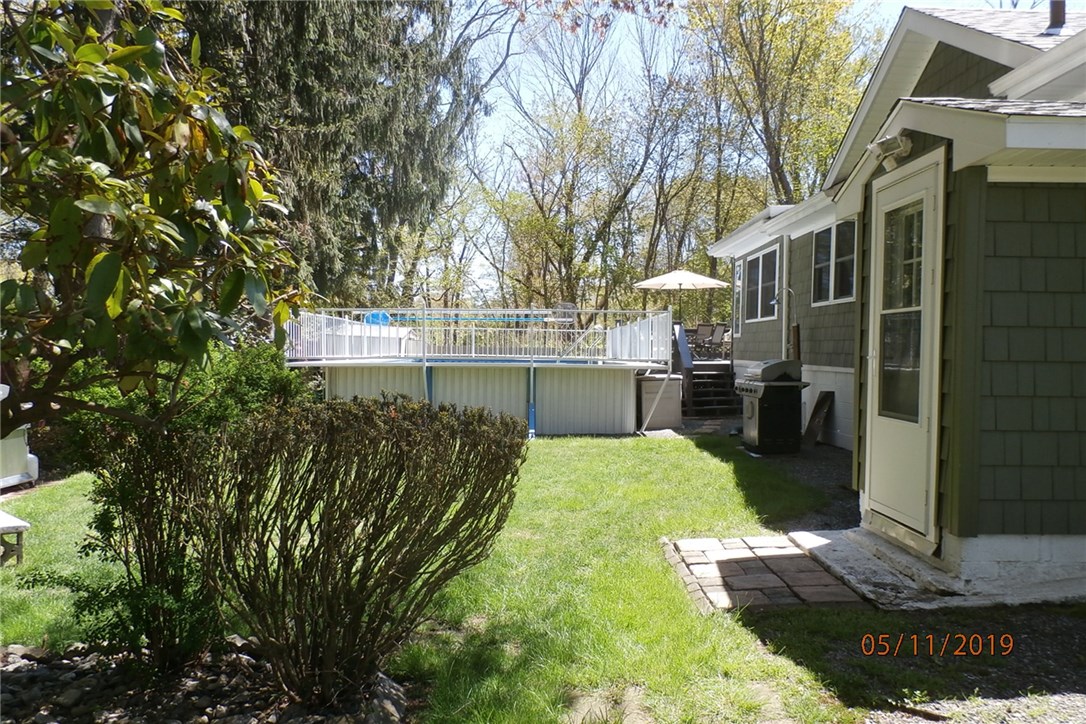 108 Lakeland Road Cranston, RI 02910 - Photo 4 of 31 LARGE BACKYARD WITH LOWER LEVEL WALK-OUT
