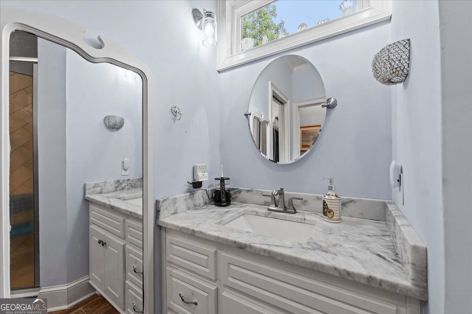 6644 East Cadley Road Norwood, GA 30821 - Photo 12 of 53 a en suite bathroom with a granite countertop double vanity sink and a mirror