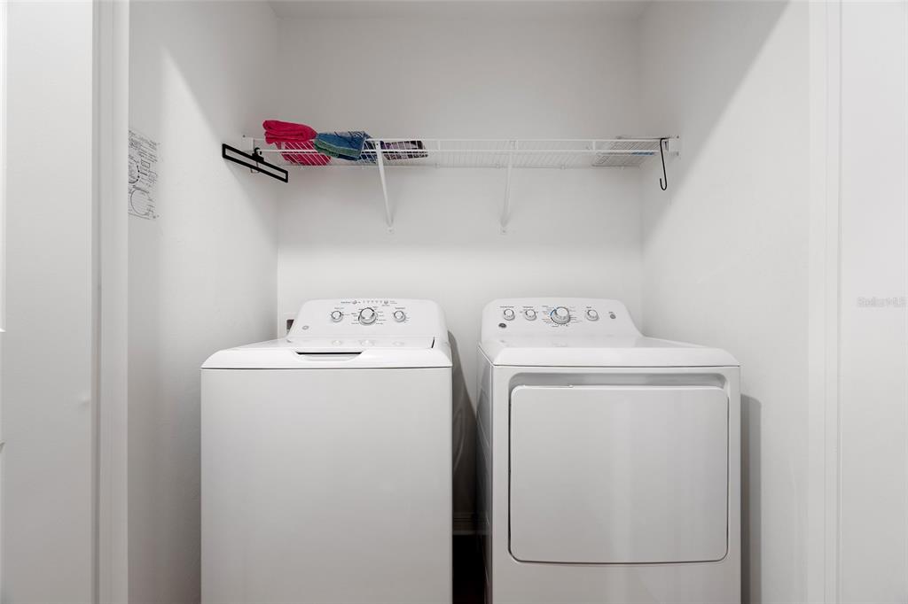 1304 Goshen Road North Port, FL 34288 - Photo 24 of 39 a utility room with dryer and washer