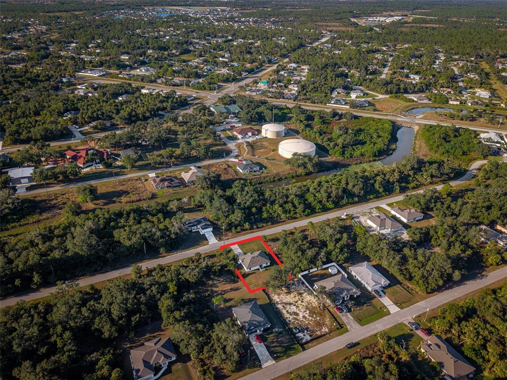 1304 Goshen Road North Port, FL 34288 - Photo 33 of 39 an aerial view of city lake and trees