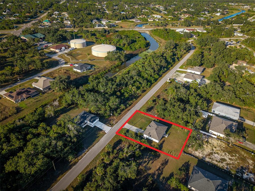 1304 Goshen Road North Port, FL 34288 - Photo 34 of 39 an aerial view of residential houses with outdoor space