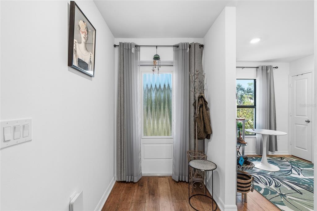 1304 Goshen Road North Port, FL 34288 - Photo 10 of 39 a view of a livingroom with furniture and wooden floor