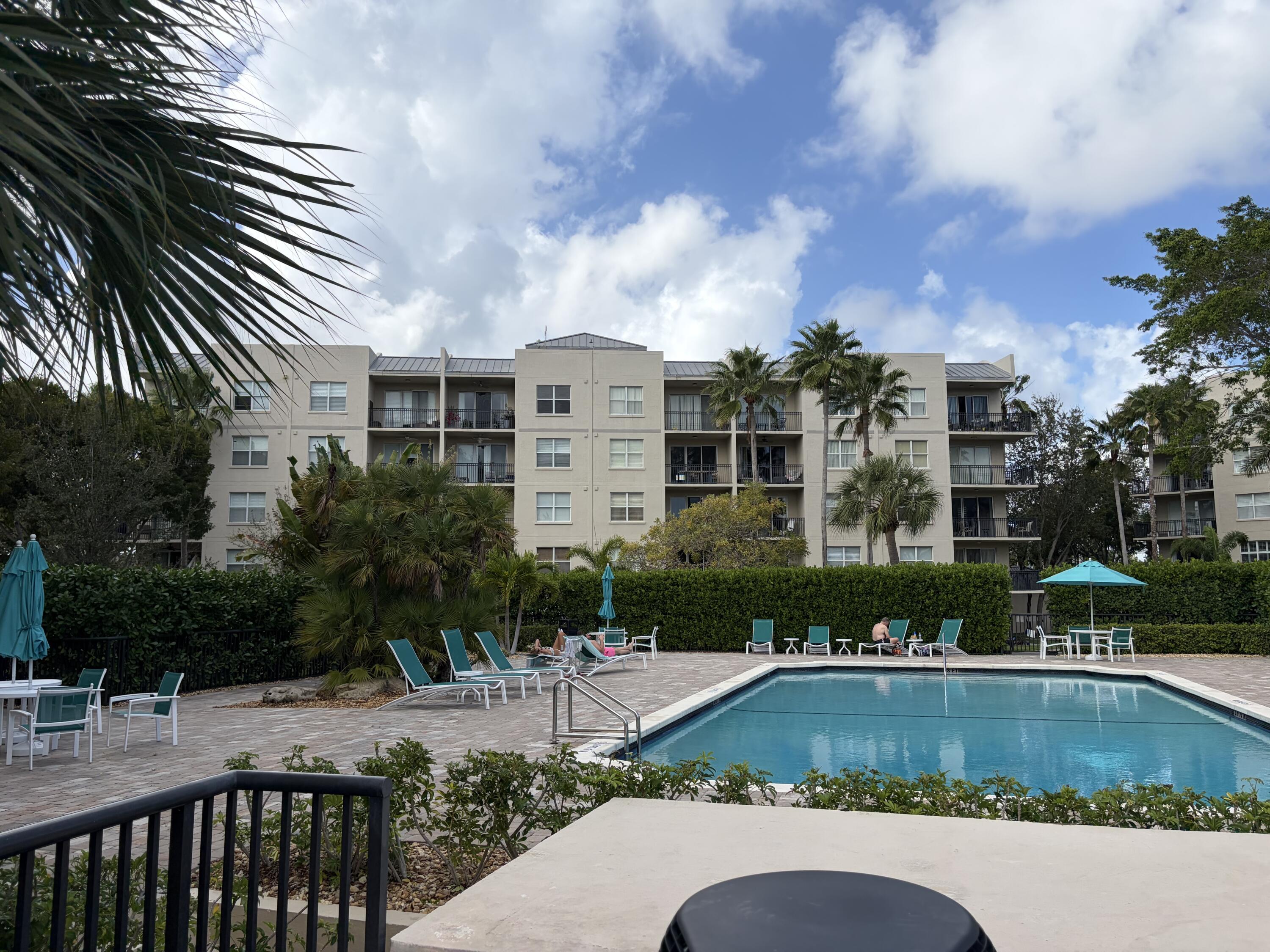 27 Royal Palm Way, Unit 304 Boca Raton, FL 33432 - Photo 20 of 26 a view of a house with a yard