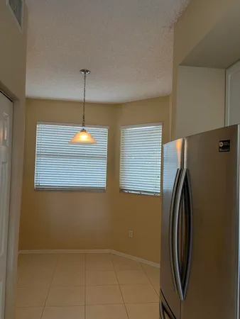 a view of a livingroom with a washer and dryer