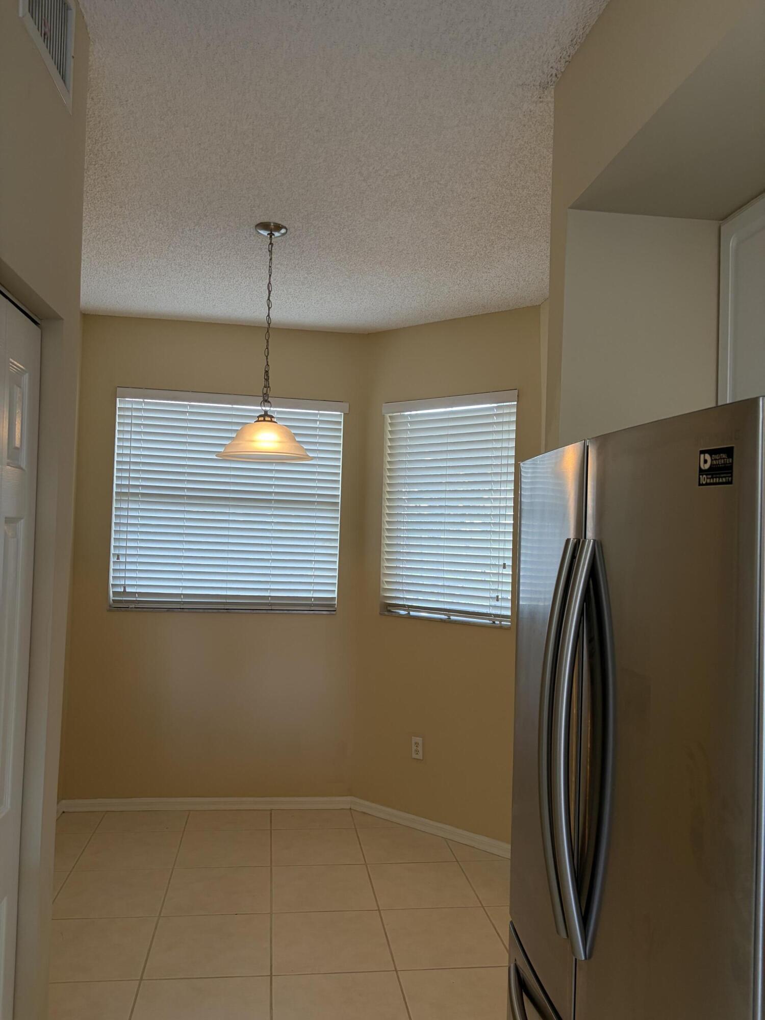 27 Royal Palm Way, Unit 304 Boca Raton, FL 33432 - Photo 3 of 26 a view of a livingroom with a washer and dryer