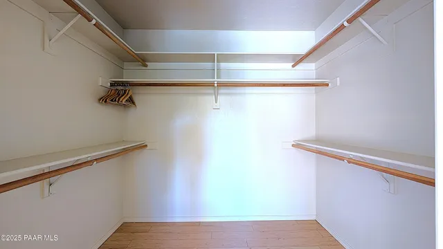 a view of a hallway with closet