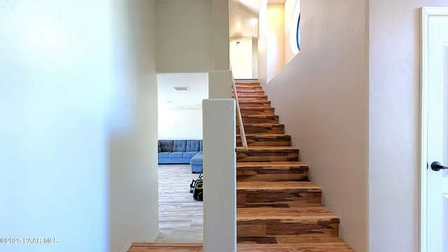 a view of entryway with wooden floor