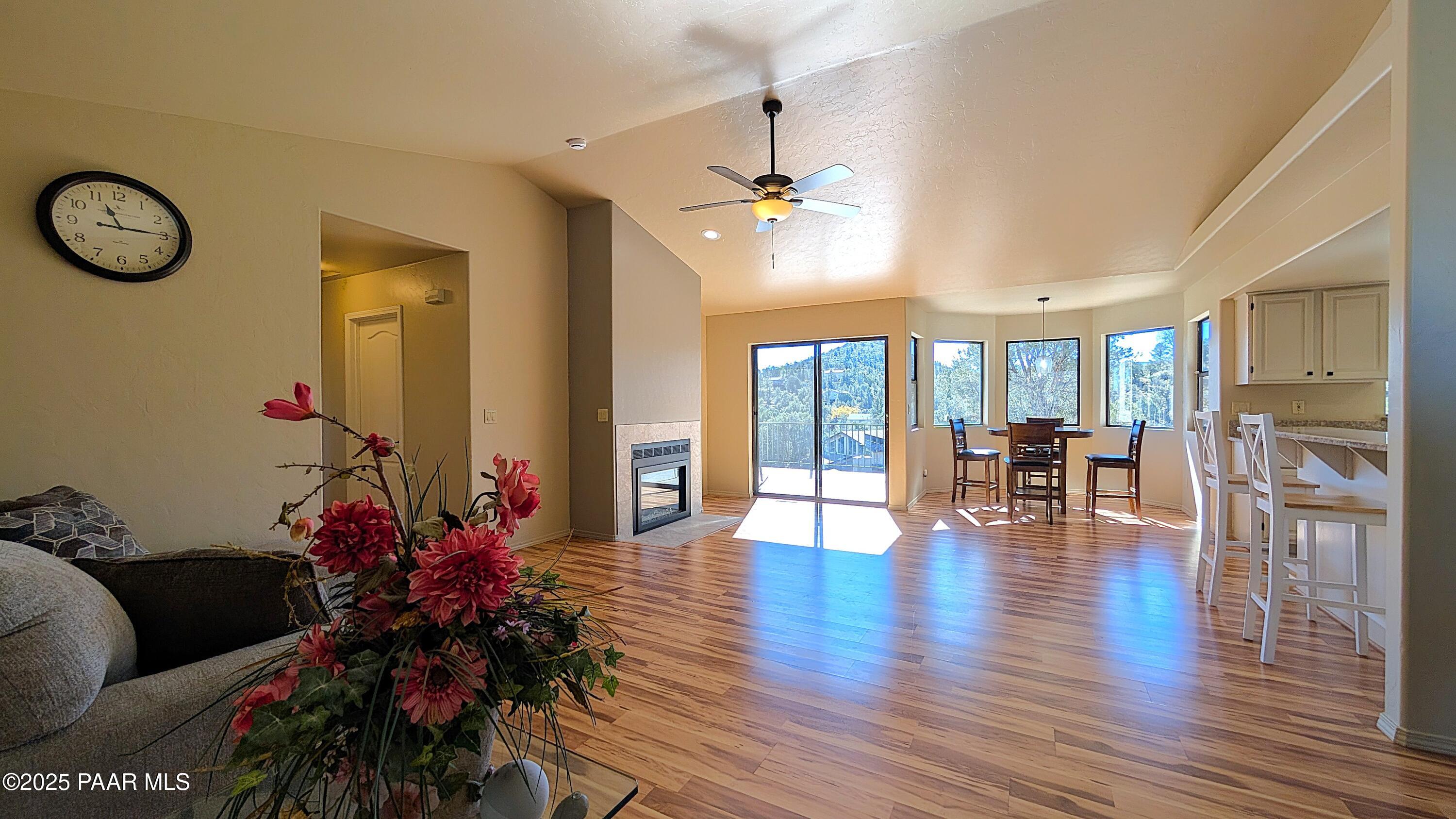 4911 Hornet Drive Prescott, AZ 86301 - Photo 3 of 29 a living room with furniture and wooden floor