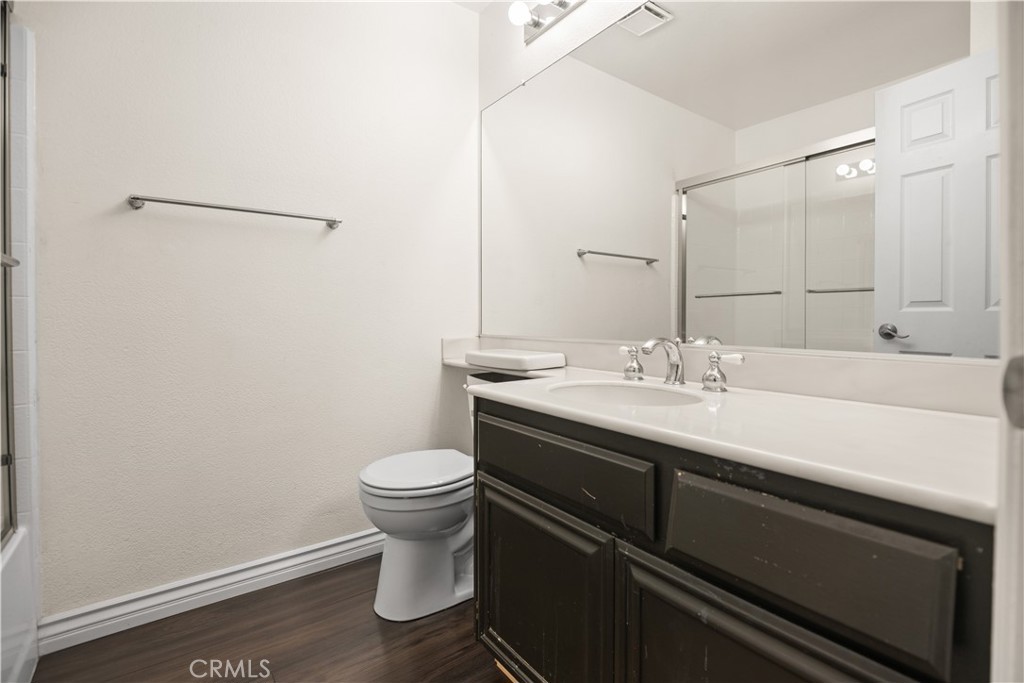 13006 August Circle Riverside, CA 92503 - Photo 14 of 19 a bathroom with a sink and a toilet