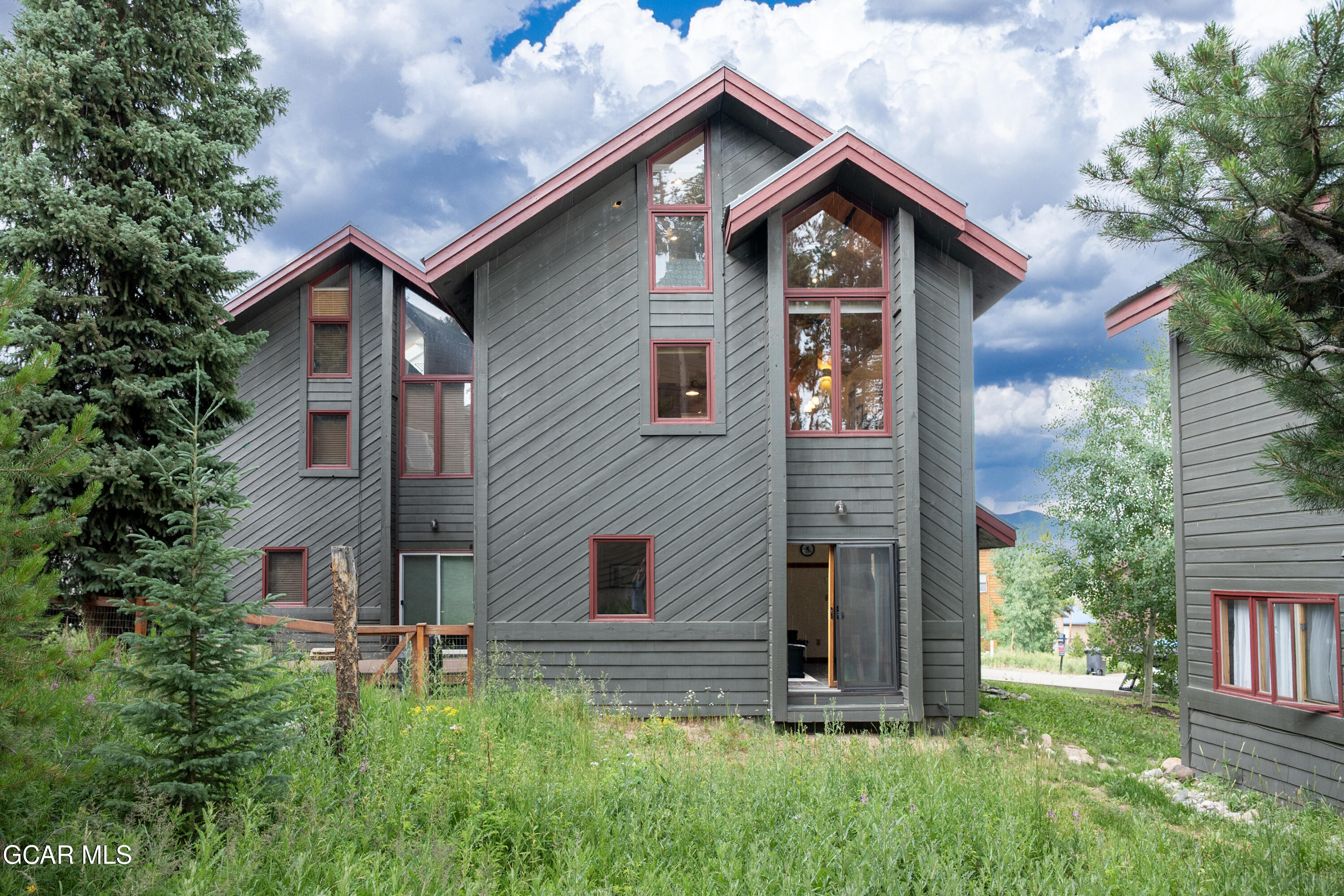 820 Wolverine Lane, Unit 3 Fraser, CO 80442 - Photo 40 of 43 a front view of a house with a yard