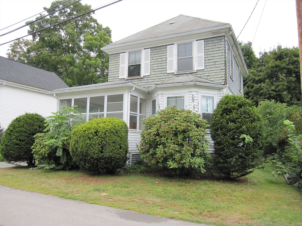 6 Broads Avenue Natick, MA 01760 - Photo 1 of 17 a view of a house with a garden