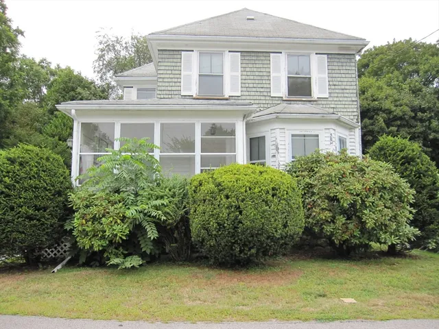 a view of a house with a garden