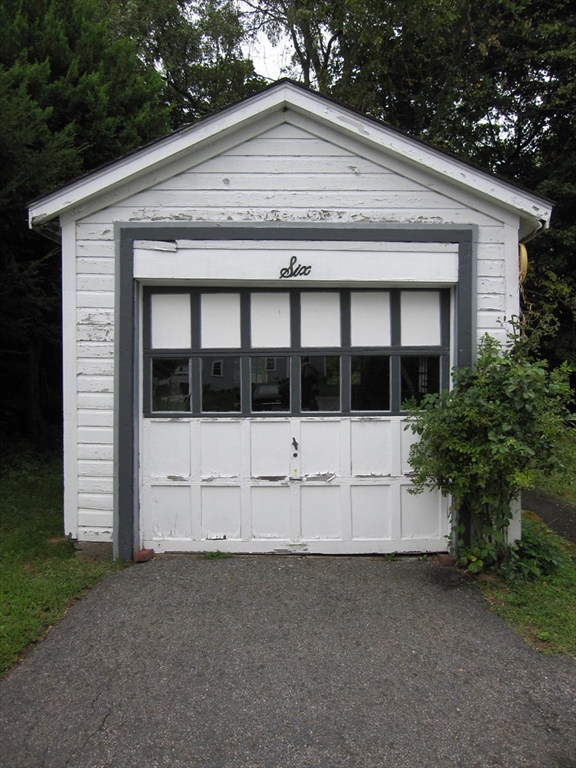 6 Broads Avenue Natick, MA 01760 - Photo 4 of 17 a view of a house with a yard