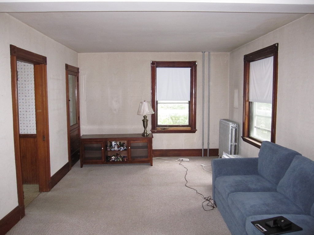 6 Broads Avenue Natick, MA 01760 - Photo 9 of 17 a living room with furniture and a window