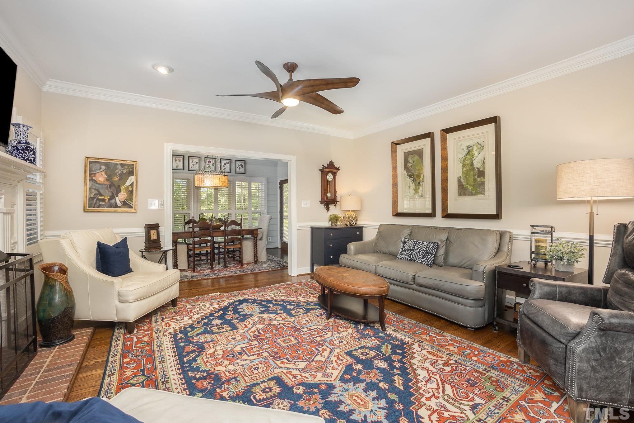 7941 Footman Way Raleigh, NC 27615 - Photo 17 of 41 a living room with furniture and a rug