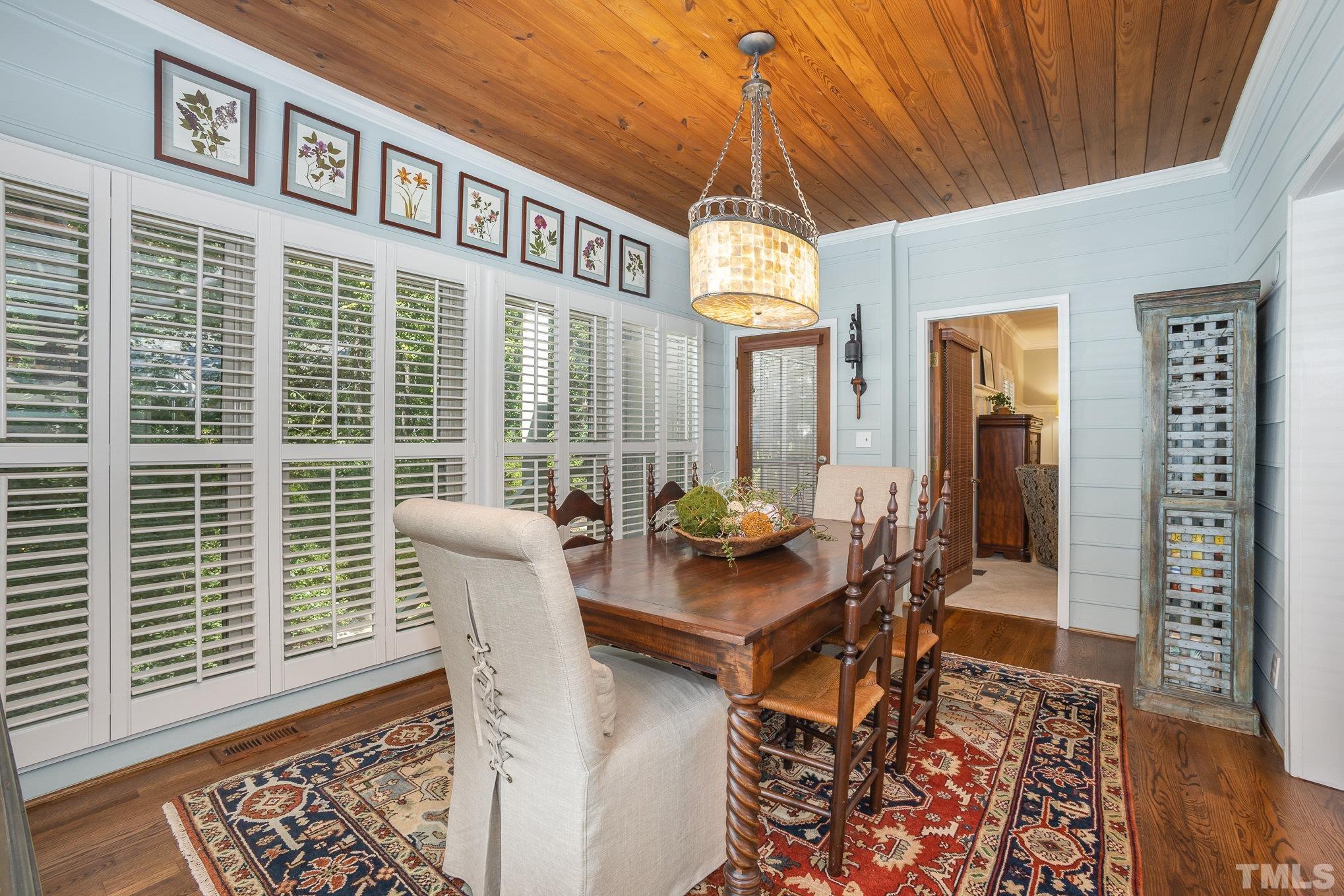 7941 Footman Way Raleigh, NC 27615 - Photo 20 of 41 a balcony with furniture and wooden floor