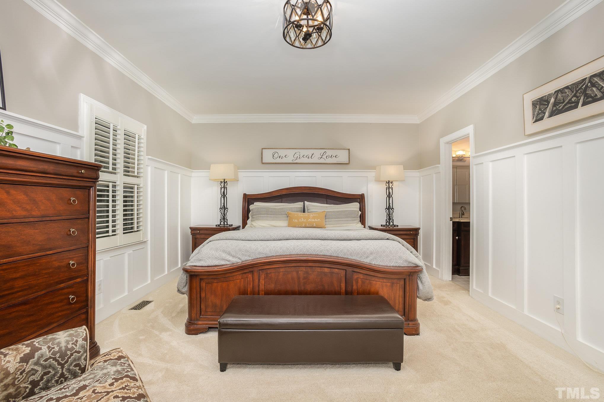 7941 Footman Way Raleigh, NC 27615 - Photo 23 of 41 a bedroom with a bed and a window