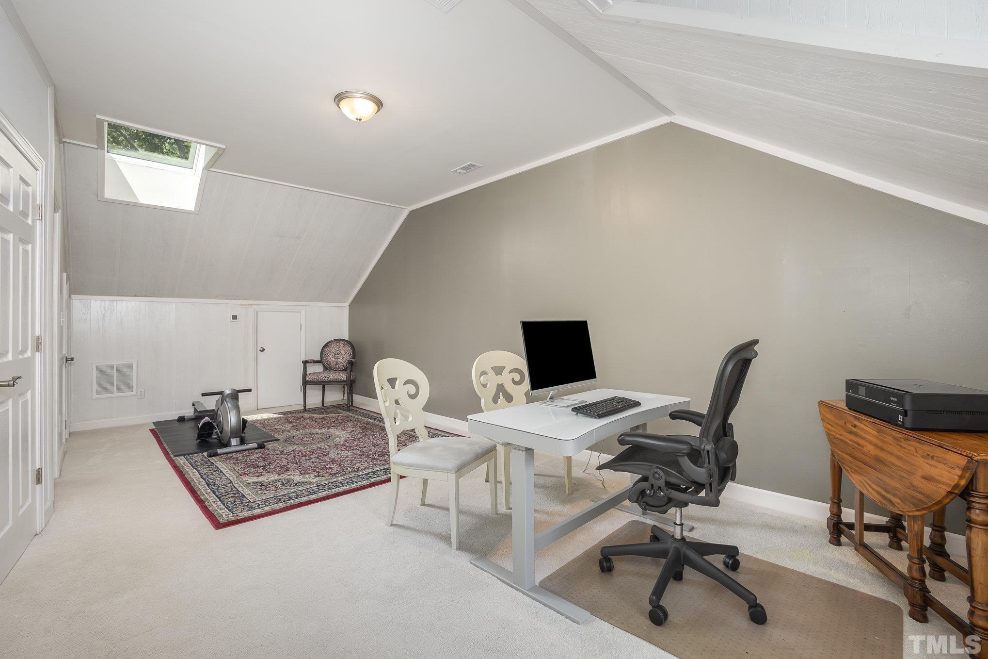 7941 Footman Way Raleigh, NC 27615 - Photo 28 of 41 a view of a workspace with furniture